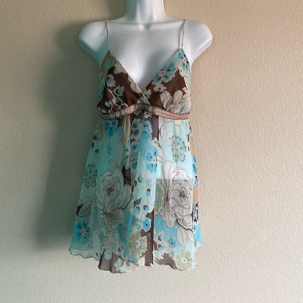 rue 21 floral blouse, size M, never used, polyester fabric